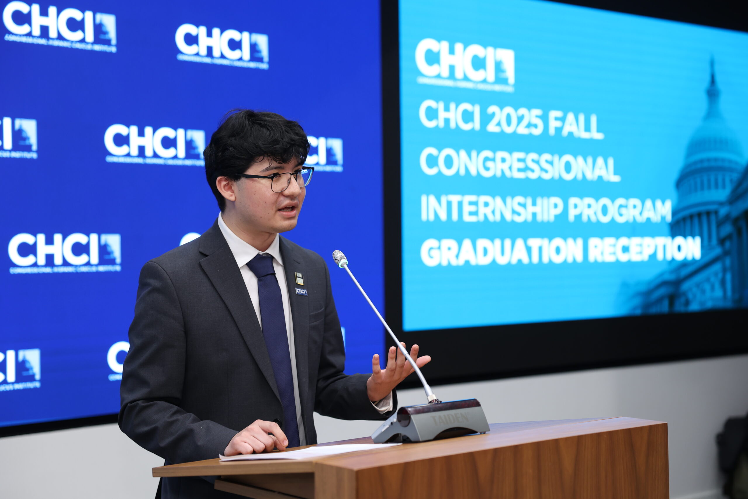 Ariel Nochez speaking at a conference